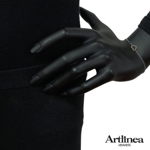 Armband aus 18 Karat Gold mit herzförmigem Mittelelement aus natürlichem Diamantpavé